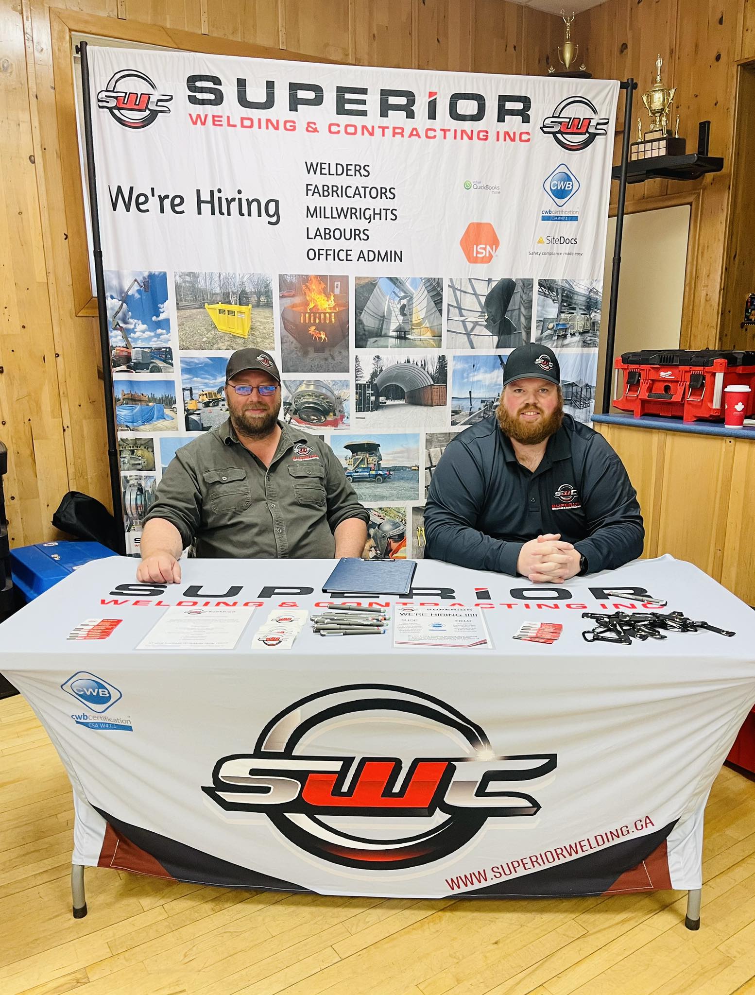 Employees at a booth at the local job fair.
